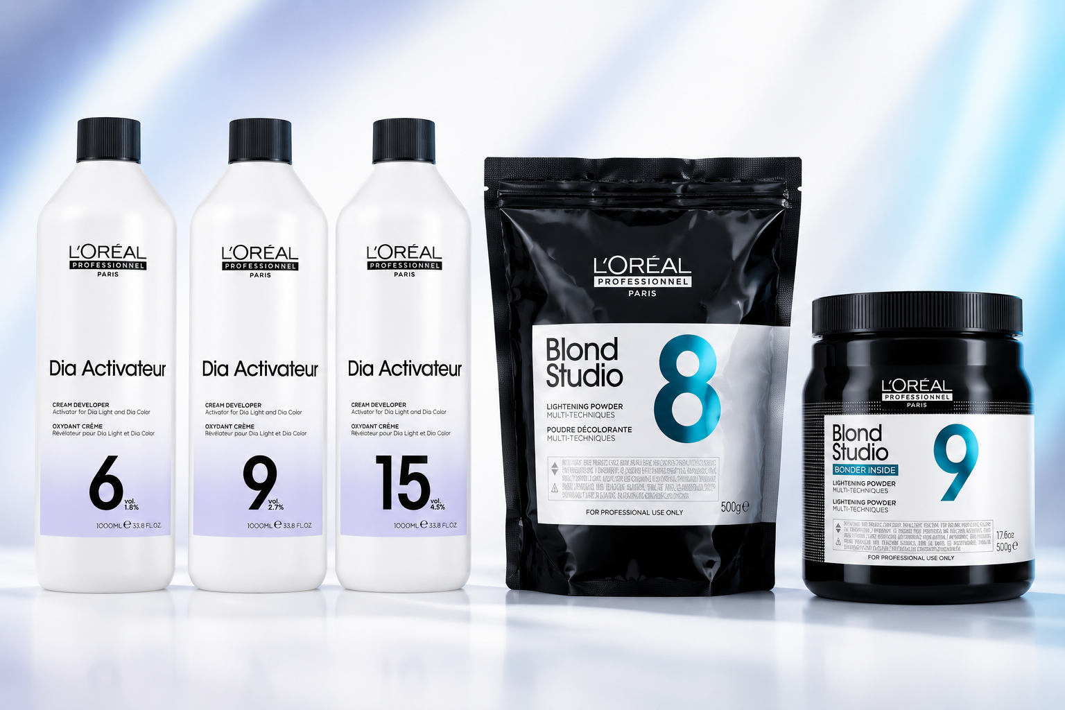 L'Oréal Professionnel Blond Studio lighteners and Dia Activateur developers displayed on a clean white background with soft blue and lilac accents.
