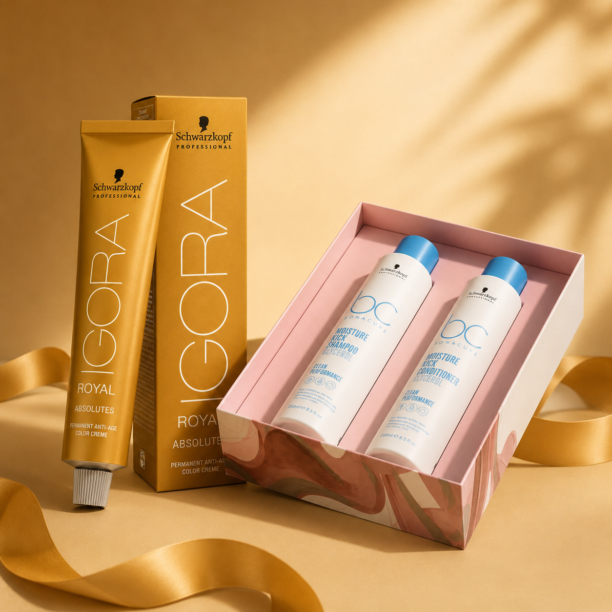Schwarzkopf Professional IGORA Royal Absolutes colour and BC Moisture Kick haircare products displayed on a premium gold and blush-toned background with a luxury salon aesthetic.