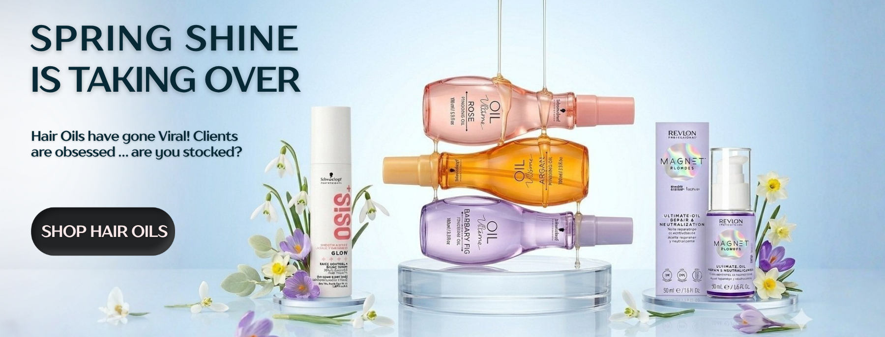 Promotional banner for hair oils with product bottles and text on a light blue background