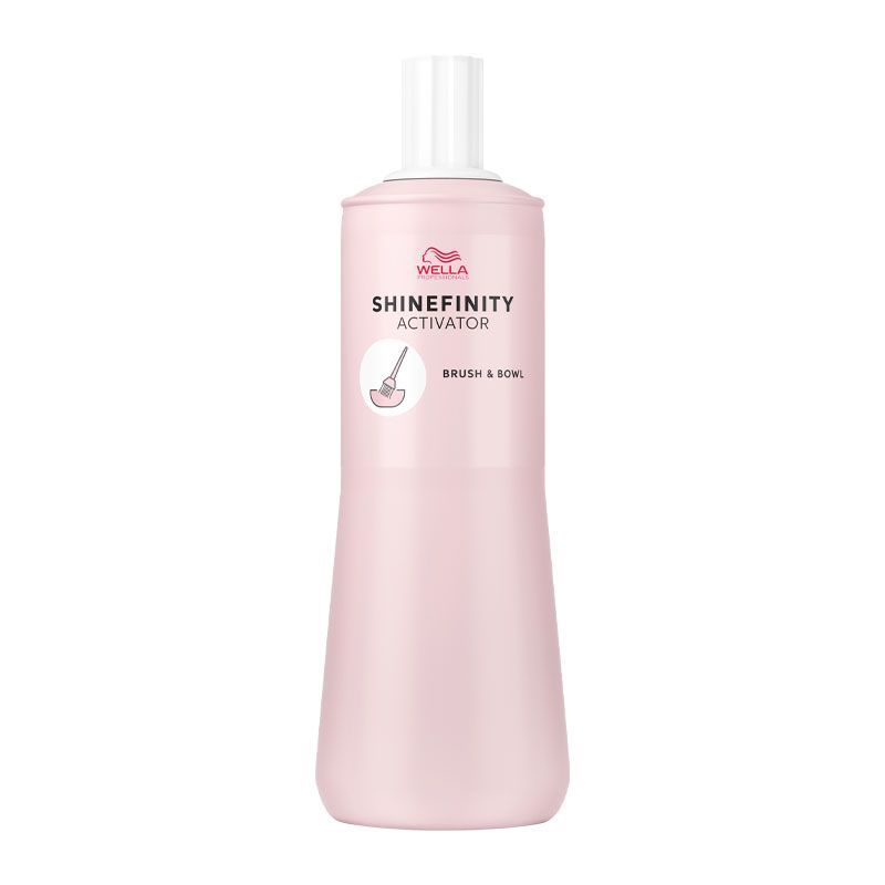 Pink bottle of Wella Shinefinity Activator on a white background